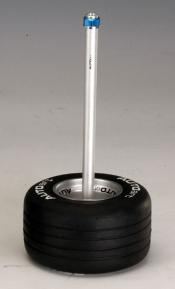 Racing wheel paper weight with pen
